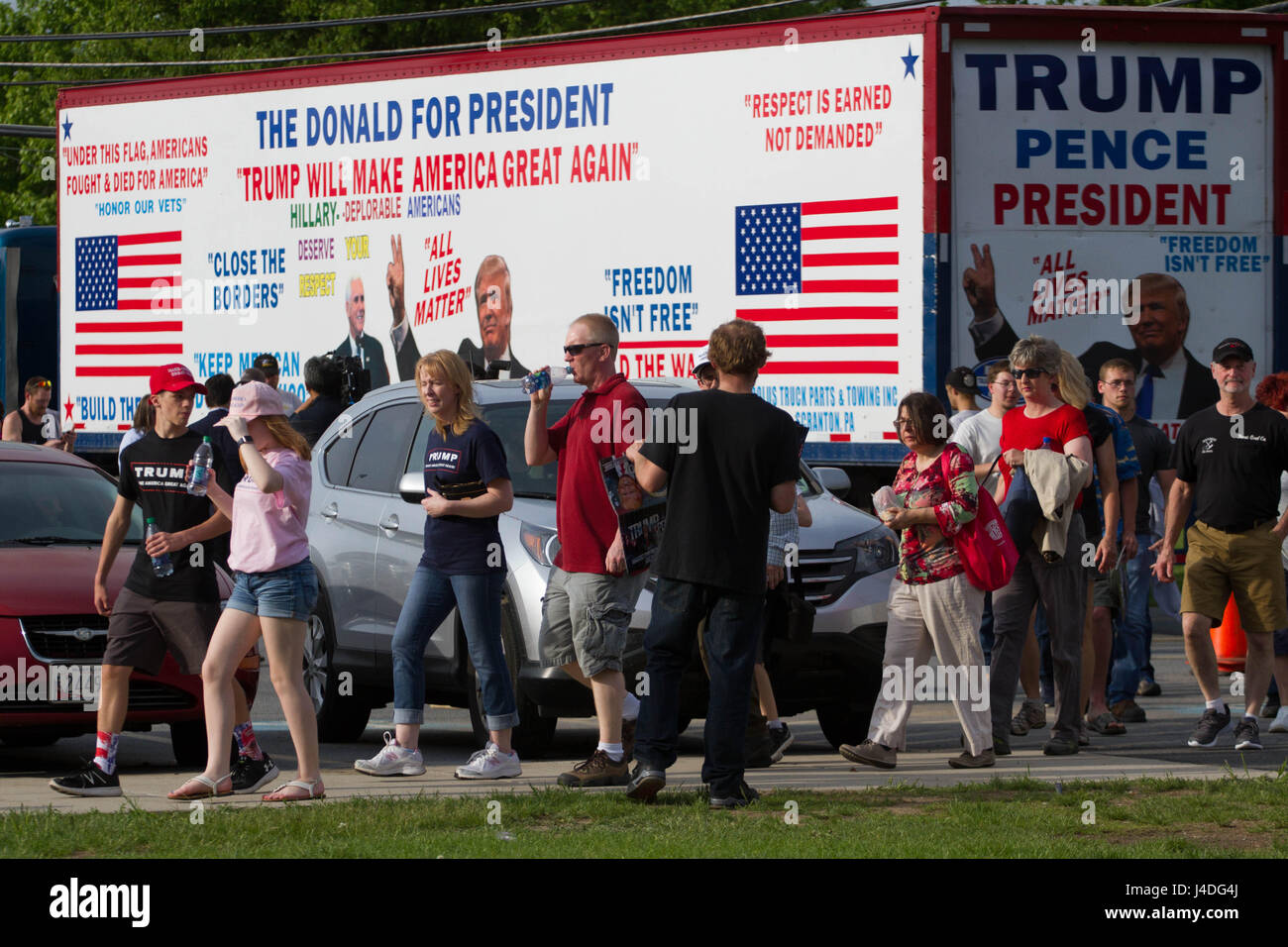 Supporters Of President Donald Trump Wait In Line To Enter A Rally