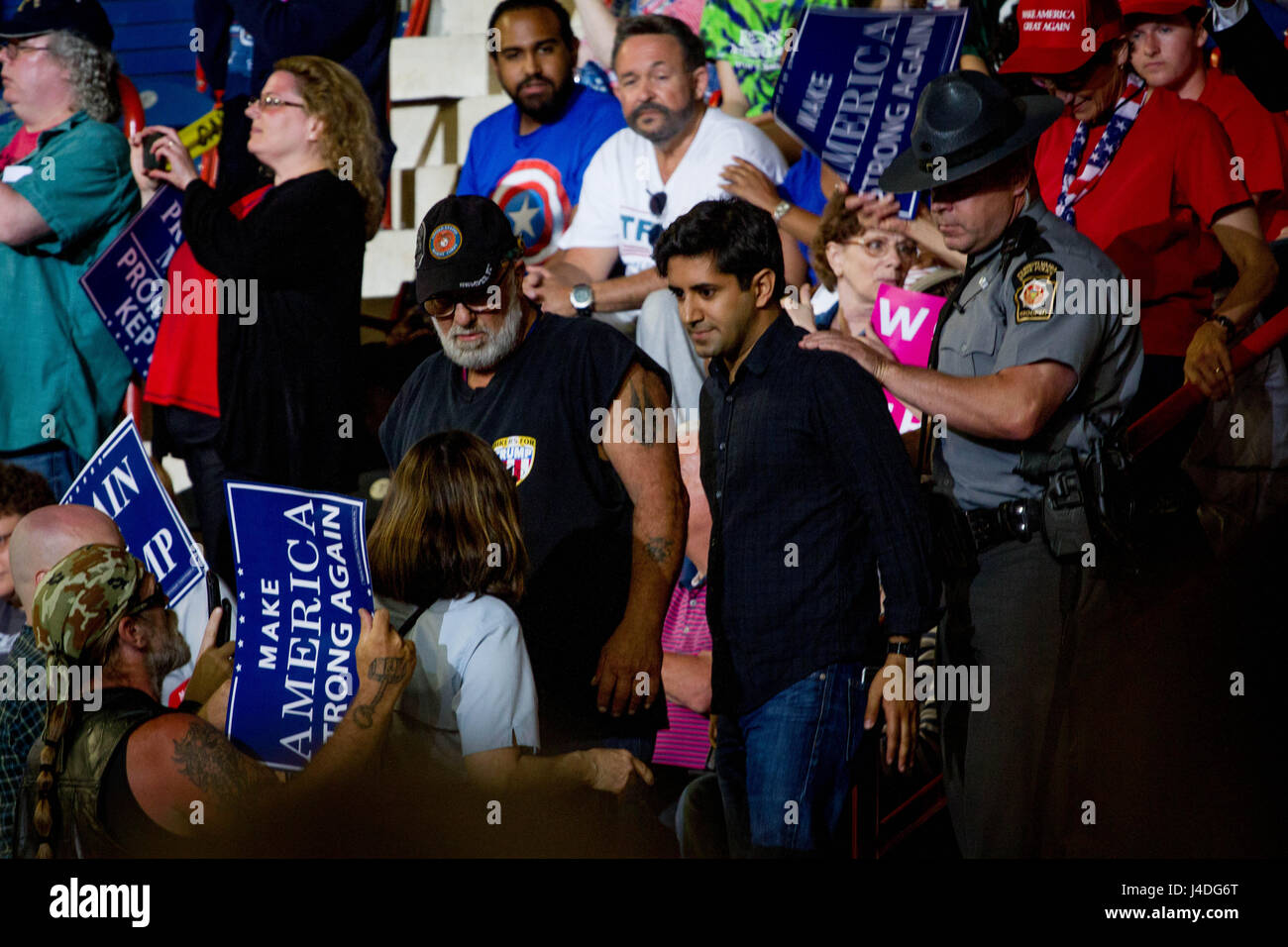Neil Makhija is surrounded by Bikers for Trump while attending a rally held in Harrisburg, PA to commemorate Trump's 100th day in office. Stock Photo