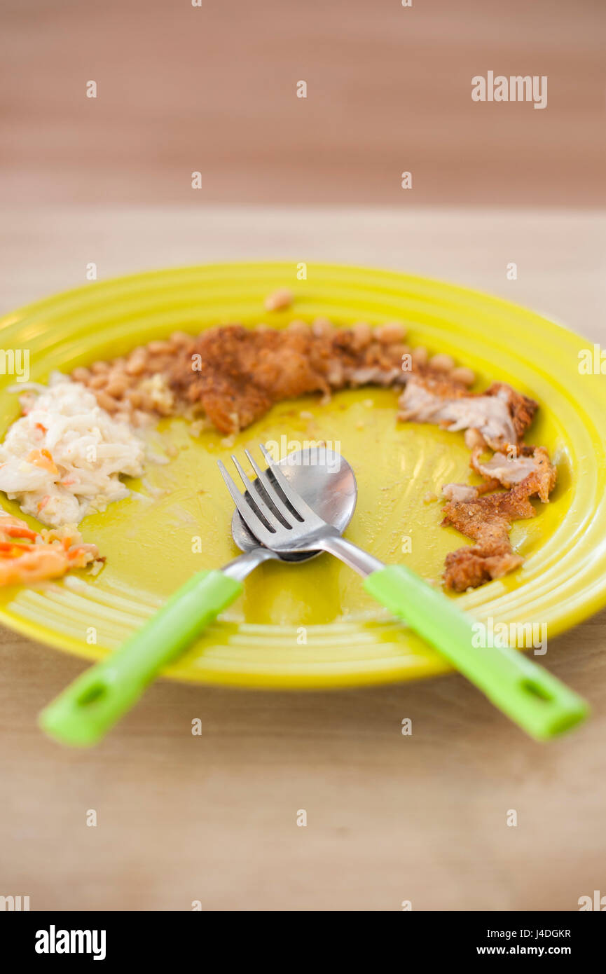 A plate of leftover food Stock Photo Alamy