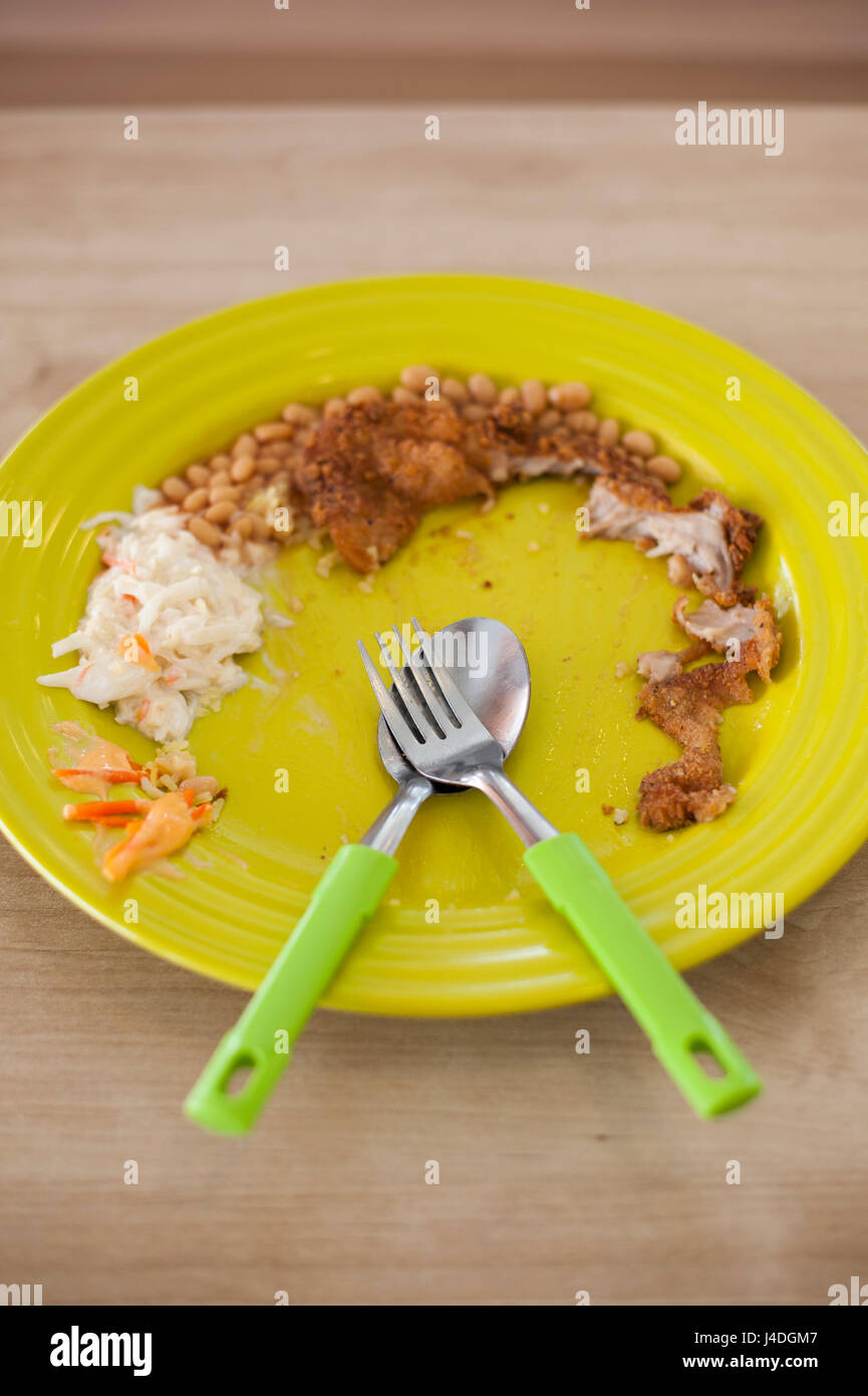A plate of leftover food Stock Photo Alamy