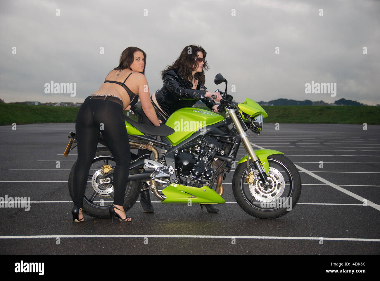 girl on triumph motorcycle