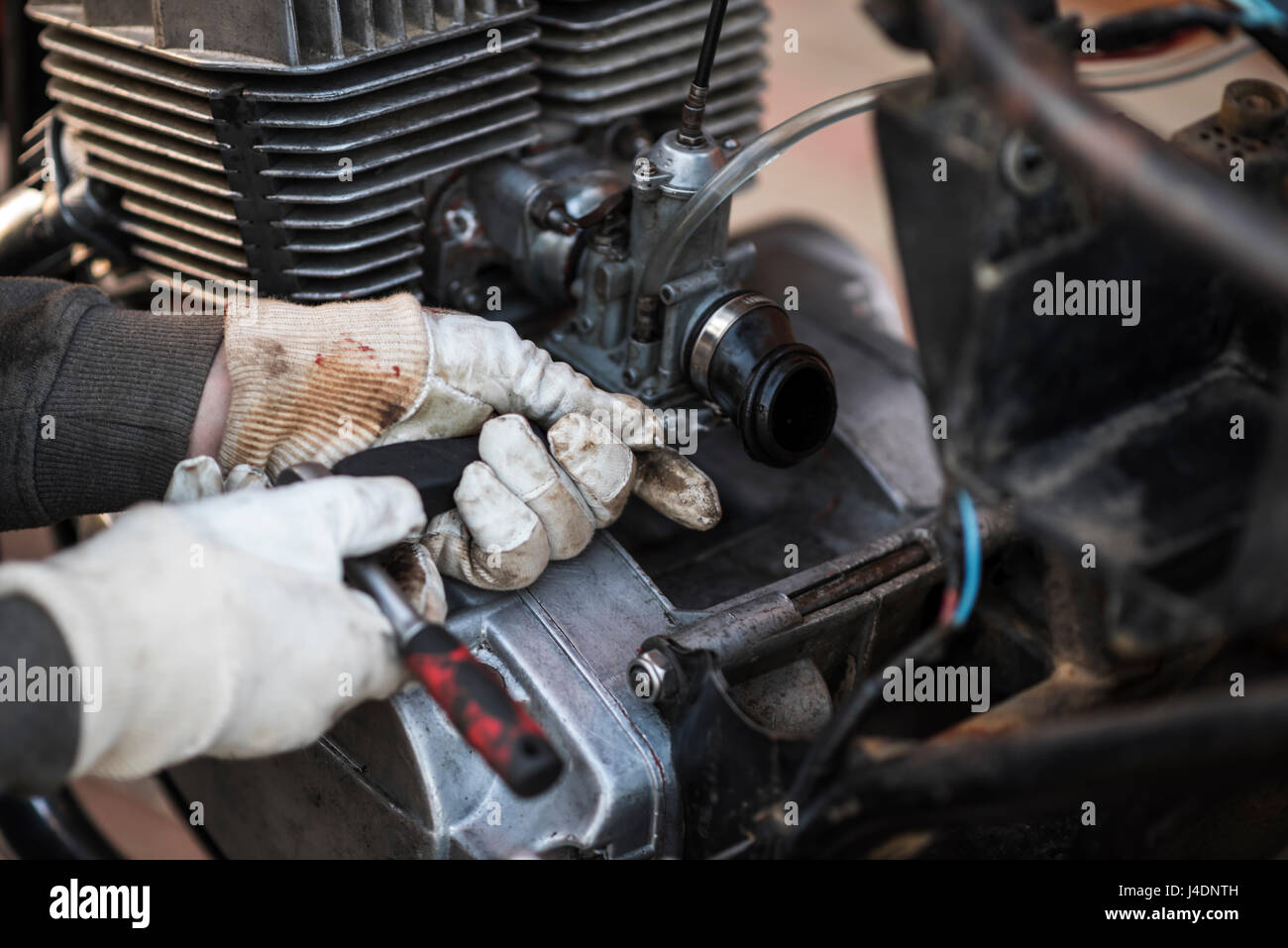 Caring and maintain for an old motorcycle, retro Stock Photo Alamy
