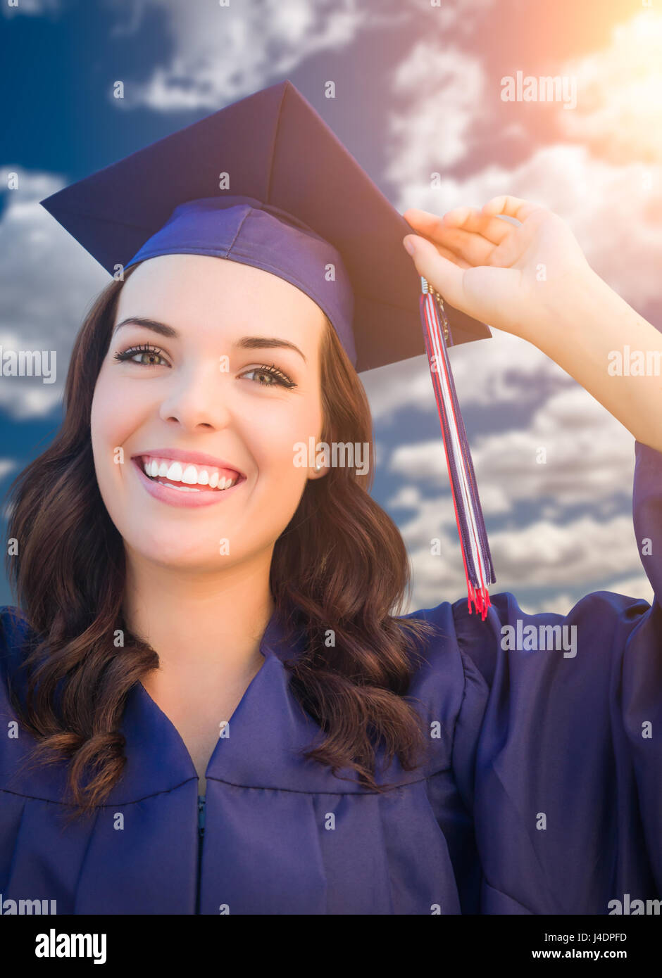 College students in cap and gown hi-res stock photography and images ...