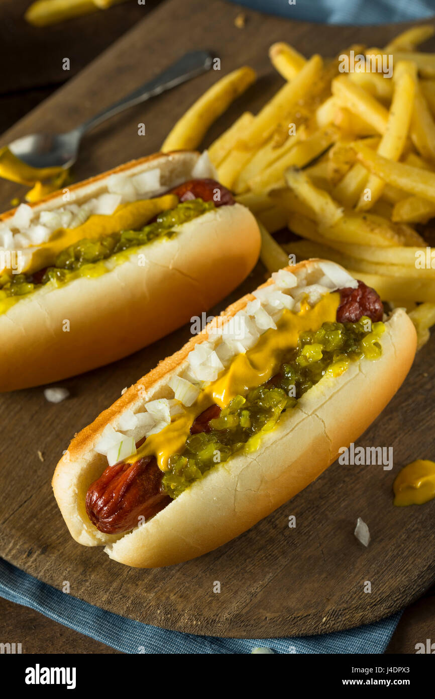 Homemade Deep Fried Hot Dogs with Mustard Onion and Relish Stock Photo