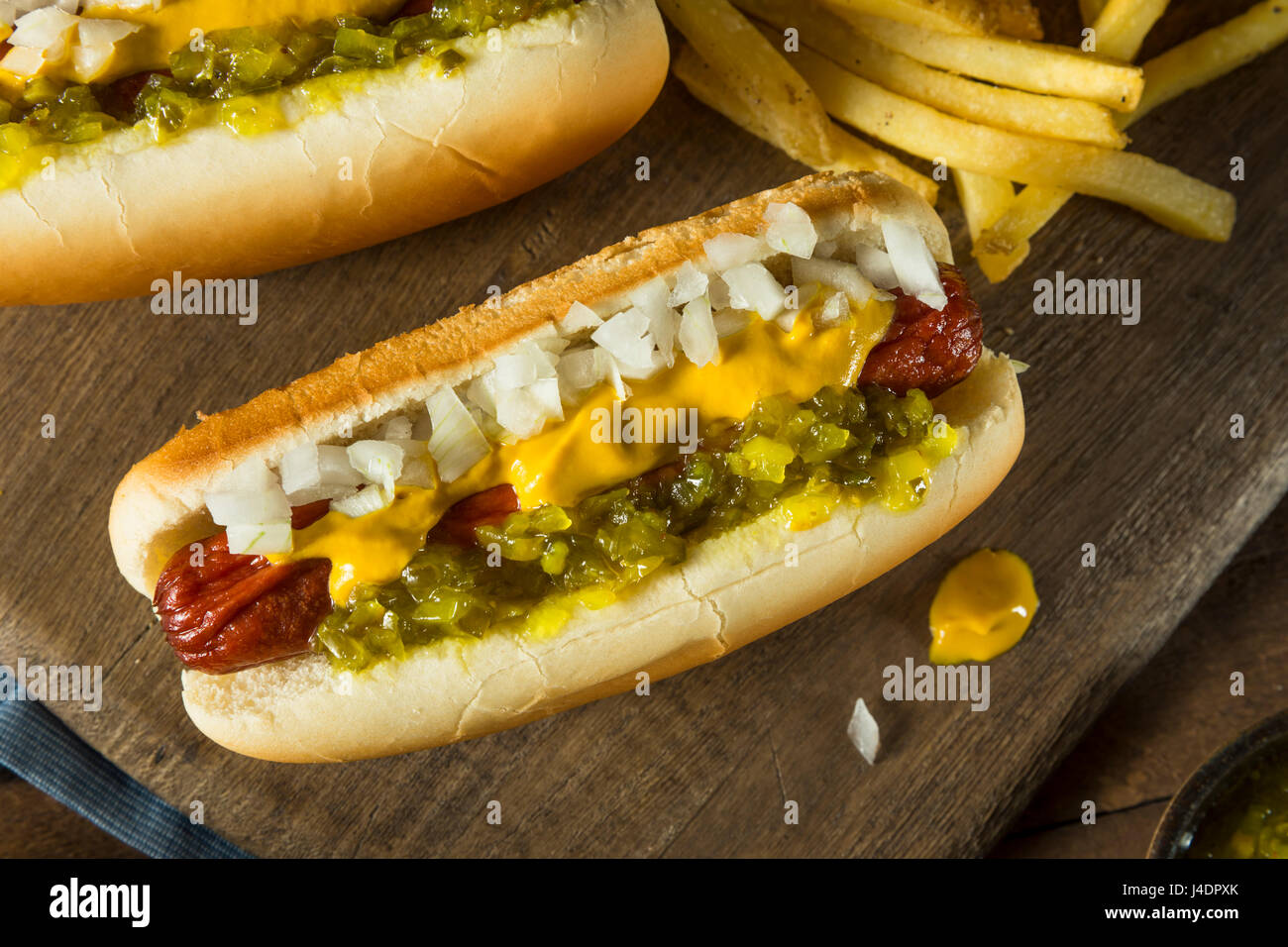 Homemade Deep Fried Hot Dogs with Mustard Onion and Relish Stock Photo