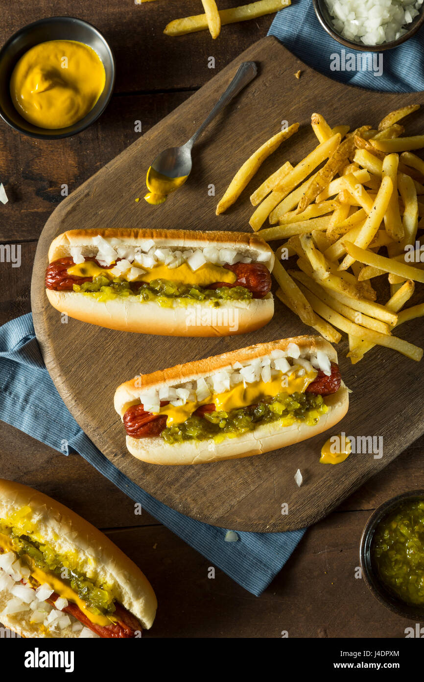 Homemade Deep Fried Hot Dogs with Mustard Onion and Relish Stock Photo