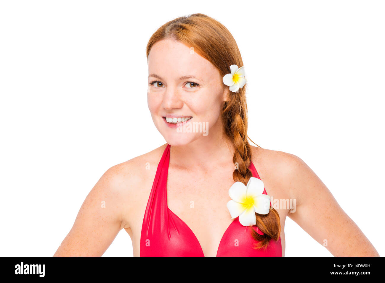 Beautiful woman with red hair with flowers of plumer in bikini on white background Stock Photo