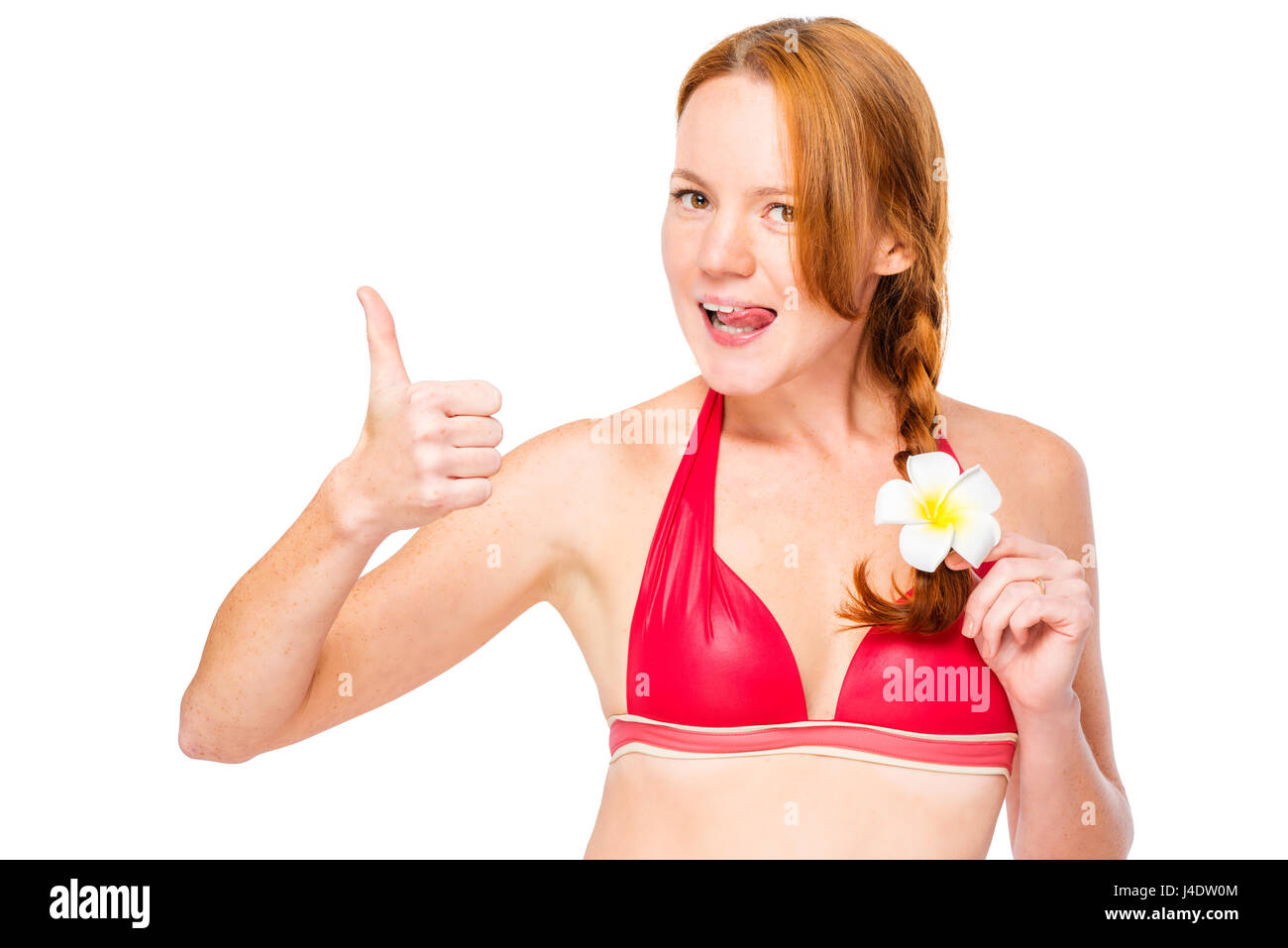 Funny girl in bikini with plumer in hair on white background posing Stock Photo
