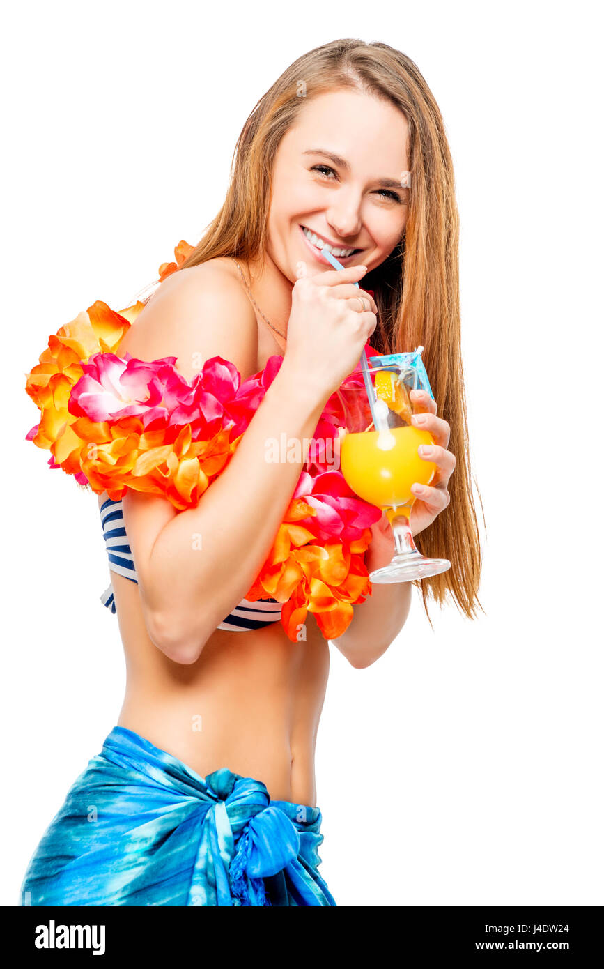 Happy girl in bikini with decoration from flowers drinking cocktail on white background Stock Photo