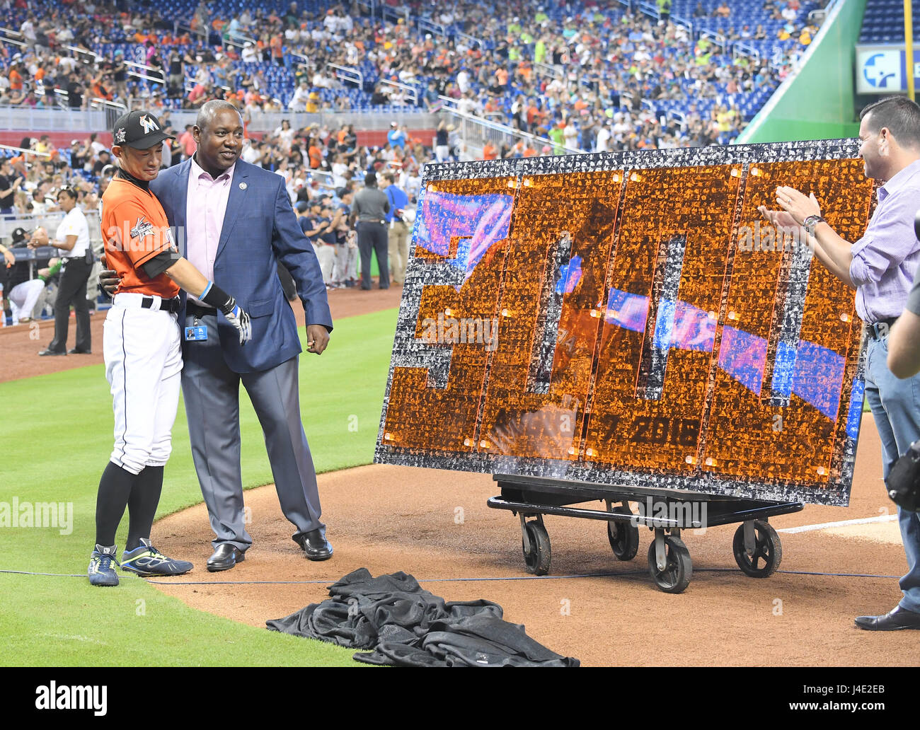 Miami, Florida, USA. 30th Apr, 2017. (L-R) Ichiro Suzuki, Michael Hill, David Samson (Marlins) MLB : Ichiro Suzuki of the Miami Marlins receives a commemorative gift in celebration of his 3000th MLB hit from Marlins President David Samson and President of baseball operations Michael Hill before the Major League Baseball game against the Pittsburgh Pirates at Marlins Park in Miami, Florida, United States . Credit: AFLO/Alamy Live News Stock Photo
