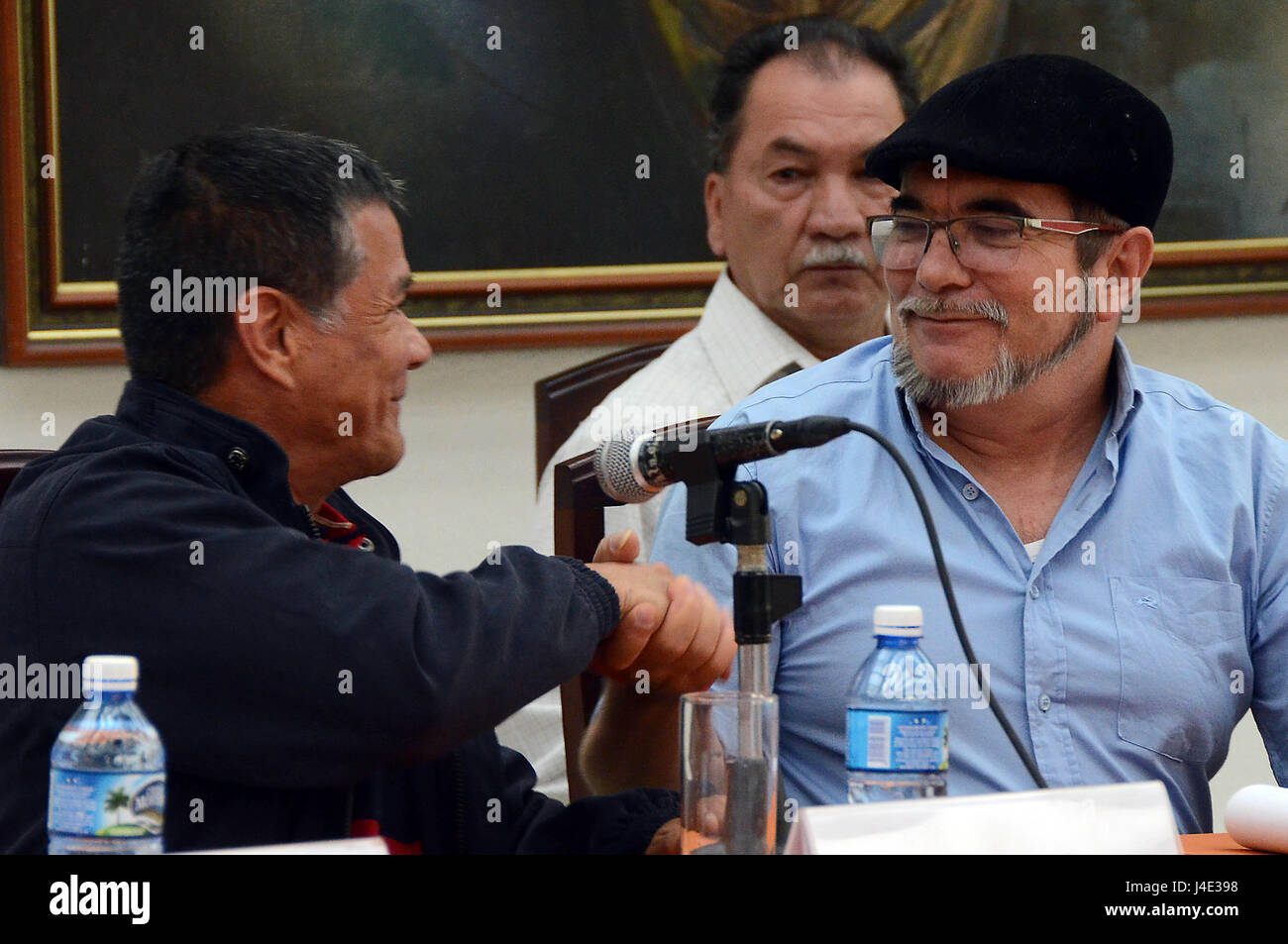 Havana, Cuba. 11th May, 2017. Rodrigo Londono (R), who is also known as Timoleon Jimenez, leader of the Revolutionary Armed Forces of Colombia (FARC), and Nicolas Rodriguez (L), commander of the National Liberation Army (ELN), attend a joint press conference in Havana, Cuba, on May 11, 2017. Colombia's top guerrilla groups on Thursday called for an end to political violence in the South American nation as well as the complete implementation of a peace process that will end over 50 years of armed conflict. Credit: Joaquin Hernandez/Xinhua/Alamy Live News Stock Photo