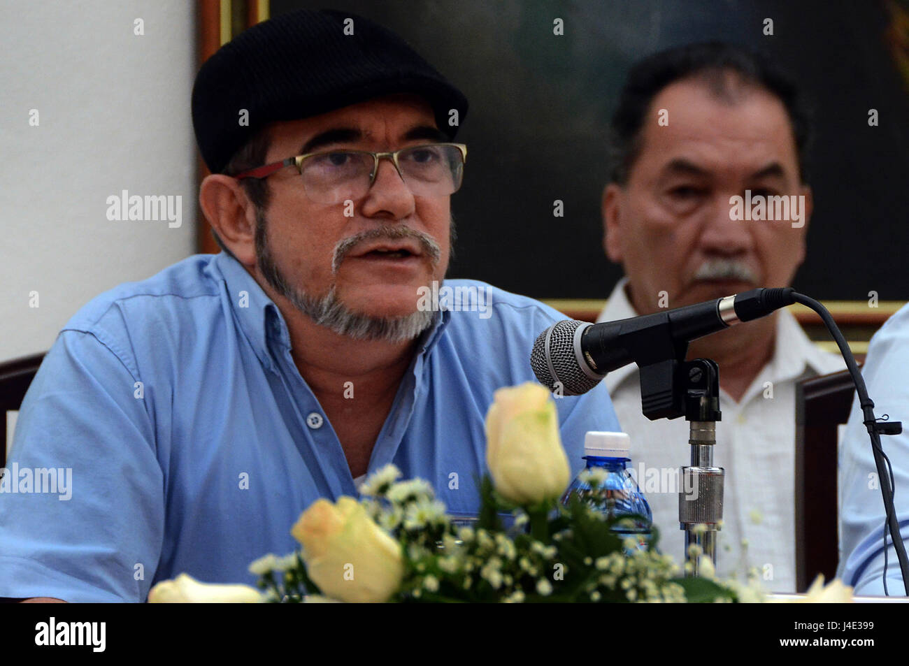 Havana, Cuba. 11th May, 2017. Rodrigo Londono (L), who is also known as Timoleon Jimenez, leader of the Revolutionary Armed Forces of Colombia (FARC), addresses a joint press conference in Havana, Cuba, on May 11, 2017. Colombia's top guerrilla groups on Thursday called for an end to political violence in the South American nation as well as the complete implementation of a peace process that will end over 50 years of armed conflict. Credit: Joaquin Hernandez/Xinhua/Alamy Live News Stock Photo