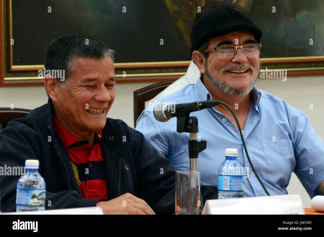 Havana, Cuba. 11th May, 2017. Rodrigo Londono (R), who is also known as Timoleon Jimenez, leader of the Revolutionary Armed Forces of Colombia (FARC), and Nicolas Rodriguez, commander of the National Liberation Army (ELN), attend a joint press conference in Havana, Cuba, on May 11, 2017. Colombia's top guerrilla groups on Thursday called for an end to political violence in the South American nation as well as the complete implementation of a peace process that will end over 50 years of armed conflict. Credit: Joaquin Hernandez/Xinhua/Alamy Live News Stock Photo