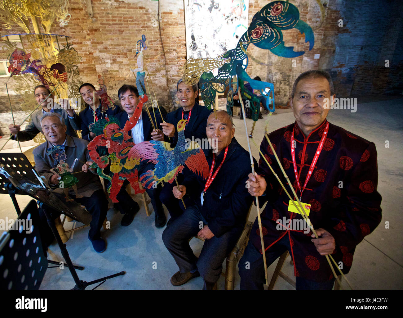 Venice, Italy. 12th May, 2017. Artist Wang Tianwen (4th R) poses for a ...