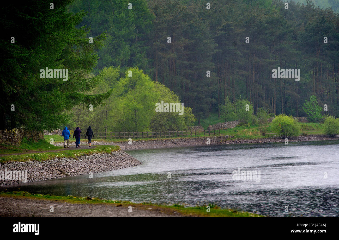 Blackburn, Lancashire, UK. 12th May, 2017. Much needed rain showers didn't deter walkers from enjoying a stroll around the Entwistle Reservoir, Blackburn, Lancashire. Picture by Paul Heyes, Friday May 12, 2017. Credit: Paul Heyes/Alamy Live News Stock Photo