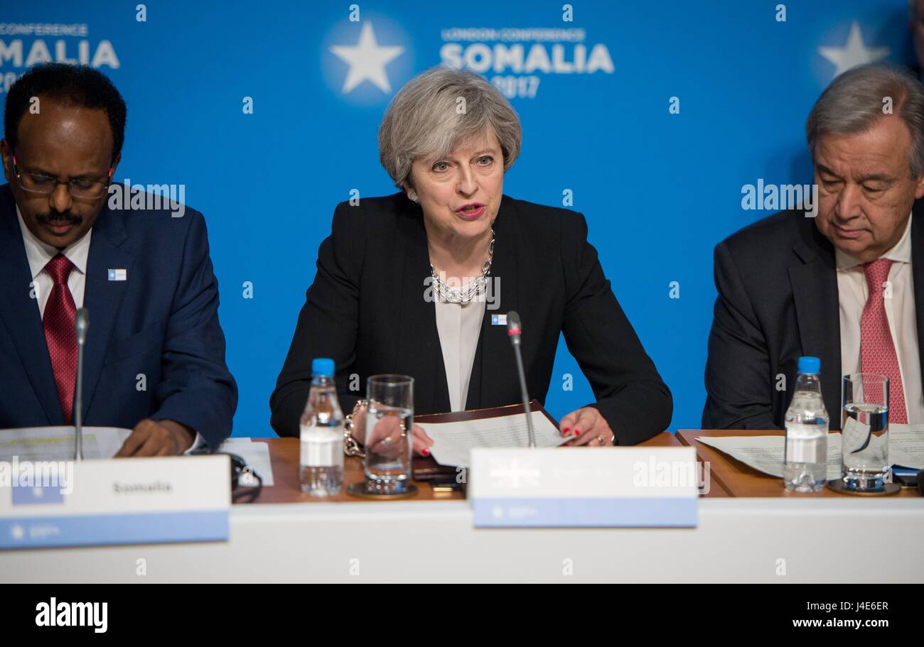 British Prime Minister Theresa May addresses delegates during the opening of the London Somalia Conference at the Lancaster House May 11, 2017 in London, United Kingdom. Stock Photo