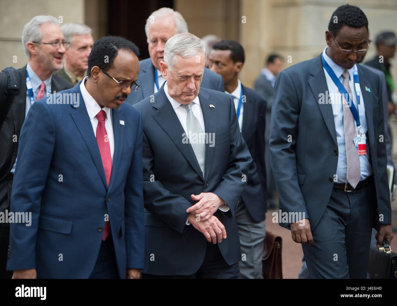 U.S. Secretary of Defense James Mattis, center, walks with Somali President Farmajo at the London Somalia Conference at the Lancaster House May 11, 2017 in London, United Kingdom. Stock Photo