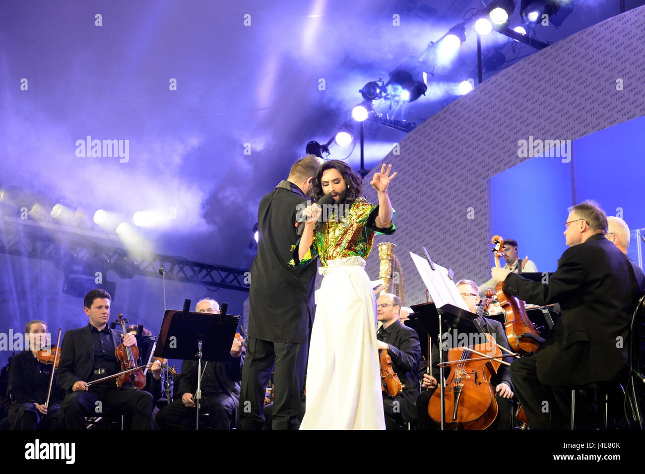Vienna, Austria. May 12, 2017. Opening of the “Wiener Festwochen” 2017 at the Wiener Rathausplatz Vienna City Hall Square. Picture shows Conchita Wurst and the Vienna Symphony Orchestra. Credit: Franz Perc / Alamy Live News Stock Photo