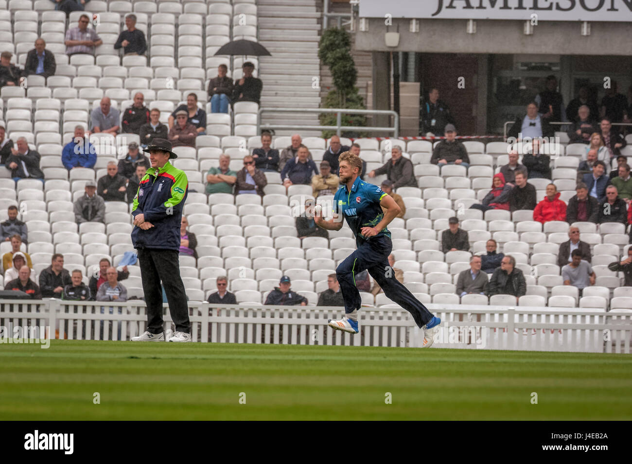 London, UK. 12th May, 2017. Ivan Thomas bowling in the rain for Kent against Surrey at The Oval Credit: Philip Pound/Alamy Live News Stock Photo