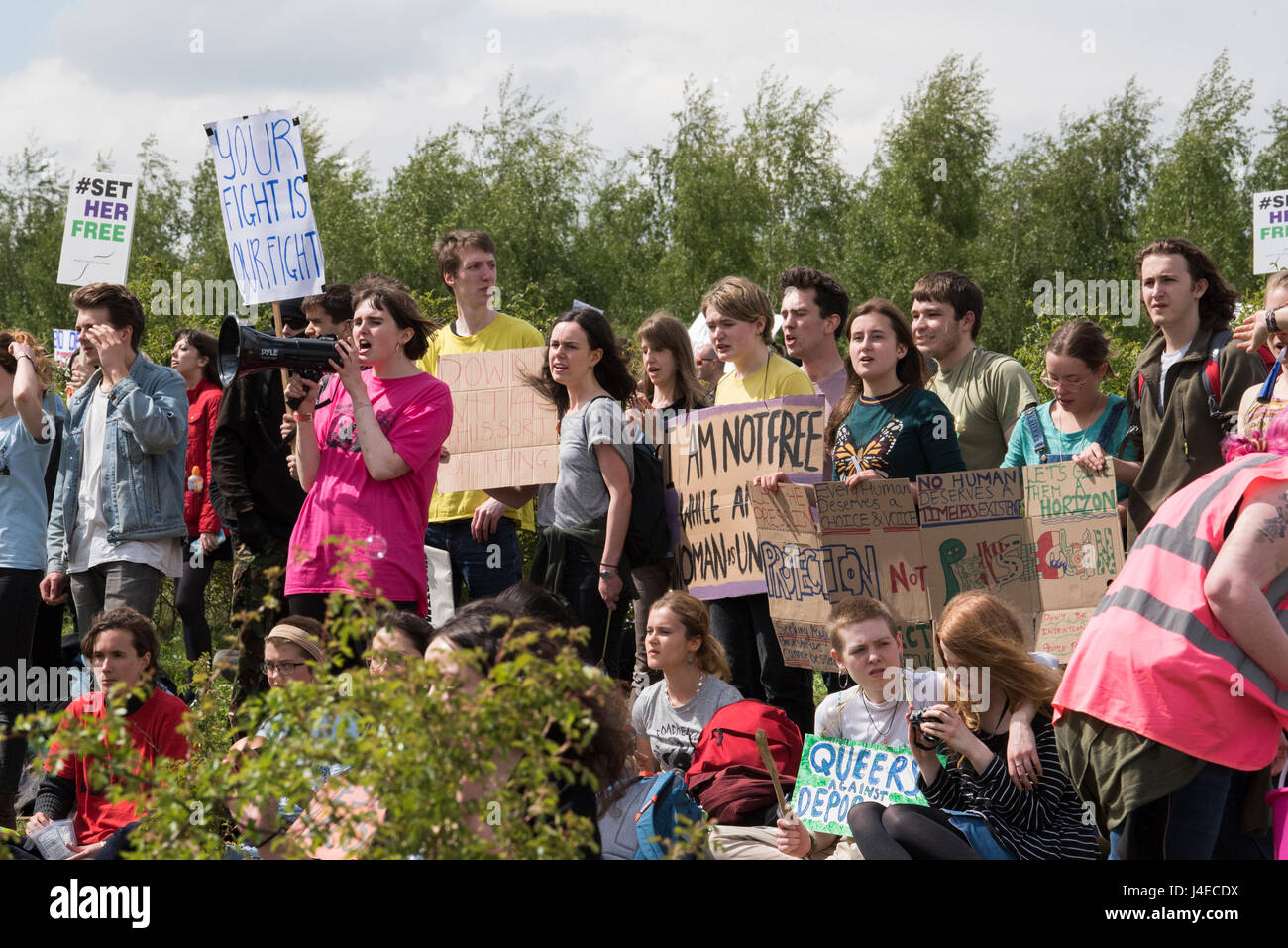 Bedfordshire, UK. 13th May 2017. Several hundred protesters have gathered at the Yarl's Wood Immigration Detention Centre in Bedfordshire to demand its closure. Police facilitated the protest to allow protesters to gather at a main perimeter fence which is normally closed to the public. Credit: Peter Manning / Alamy Live News Stock Photo