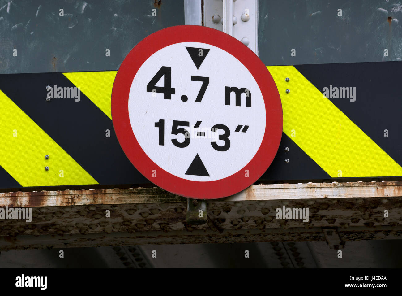 Railway bridge height restriction sign, UK Stock Photo