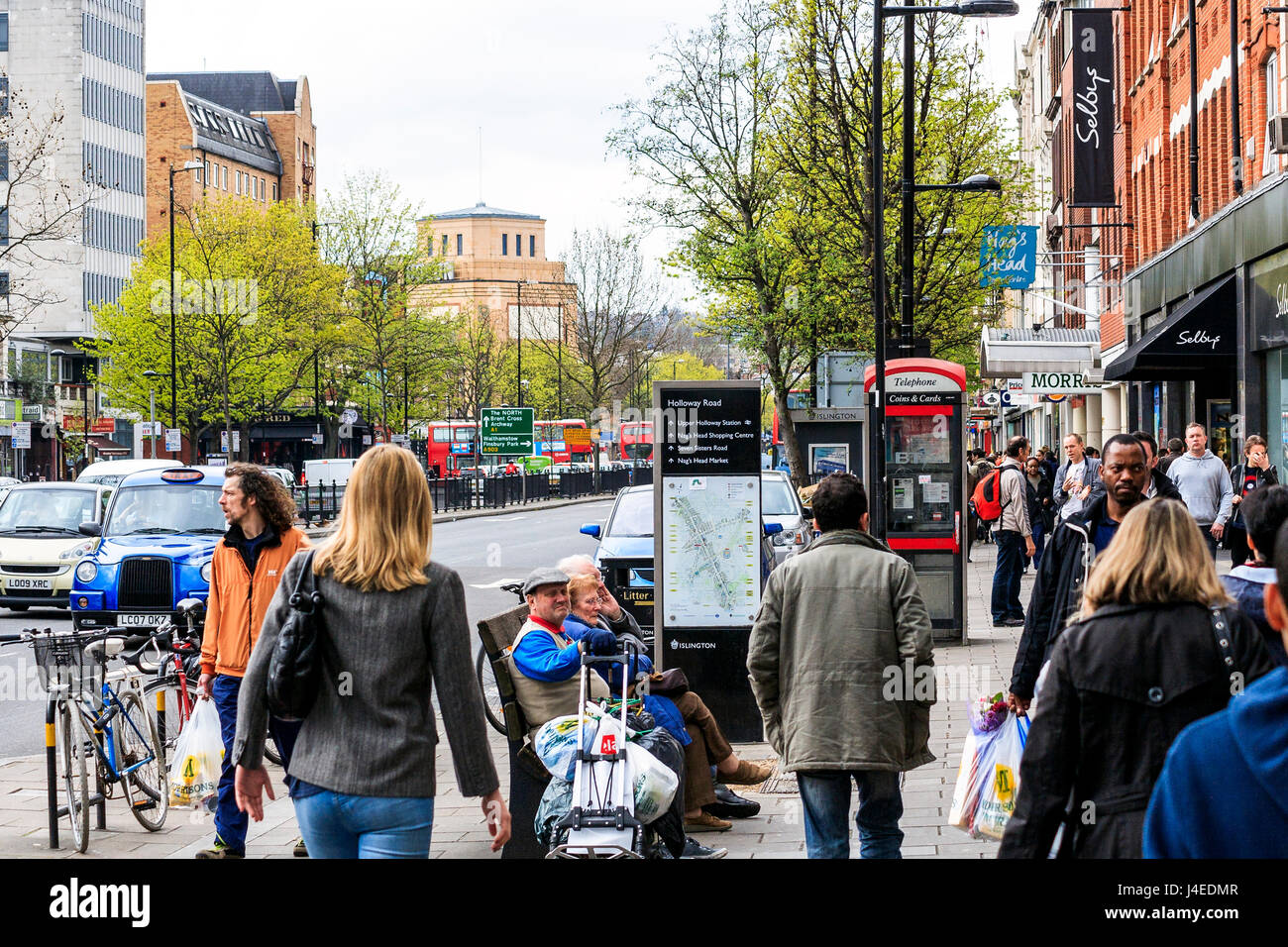 Shoppers at the Nag's Head in Holloway, North London, UK Stock Photo