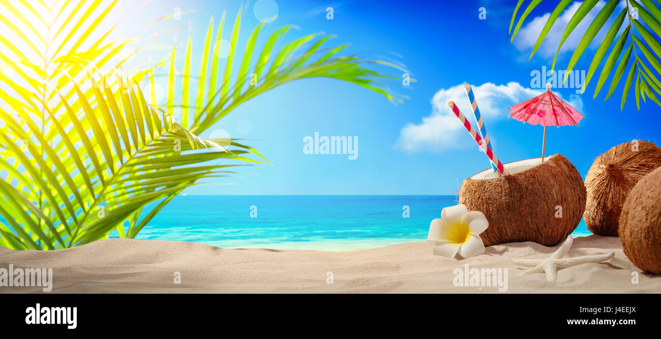 Coconut drink on beach Stock Photo Alamy