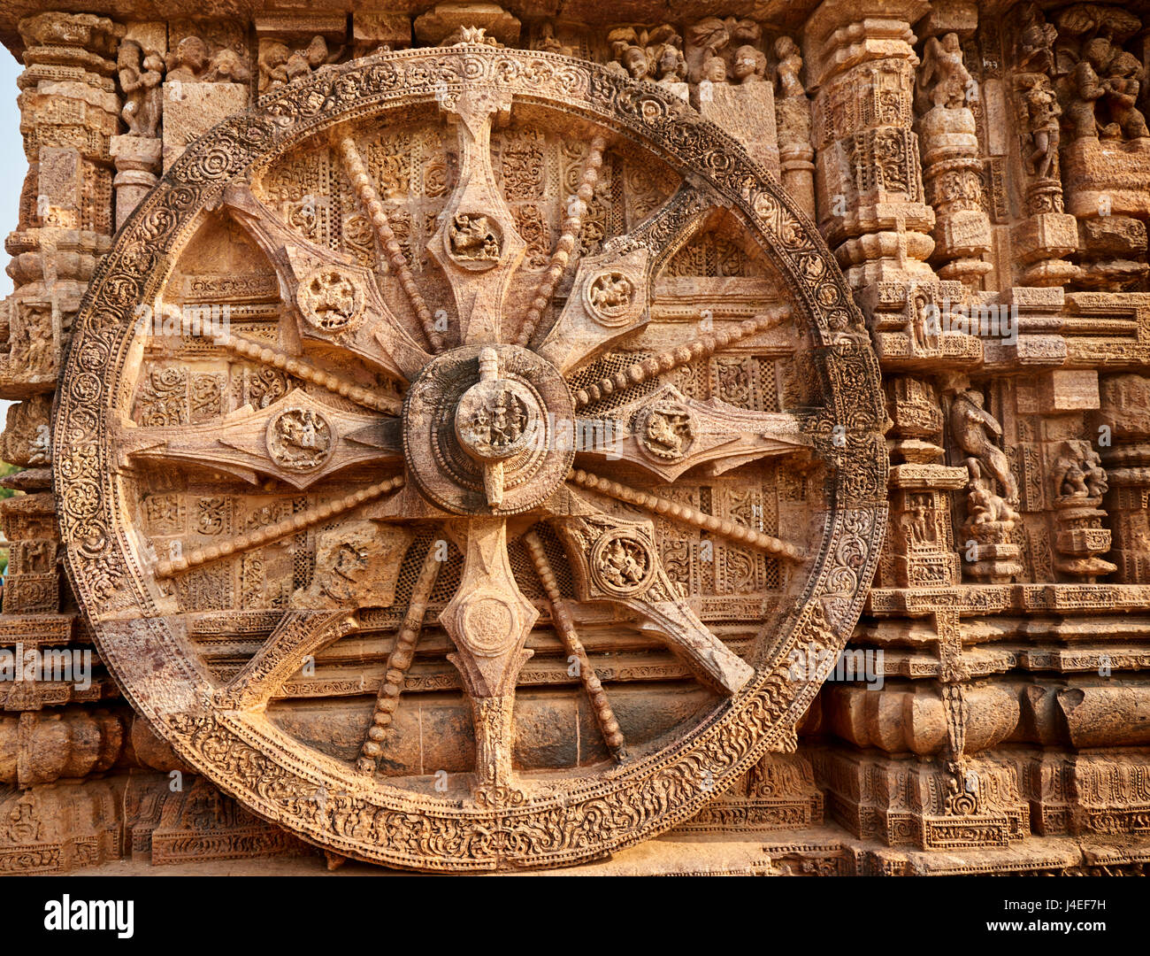 Ancient sandstone carvings on the walls of the ancient sun temple at Konark, India. Stock Photo