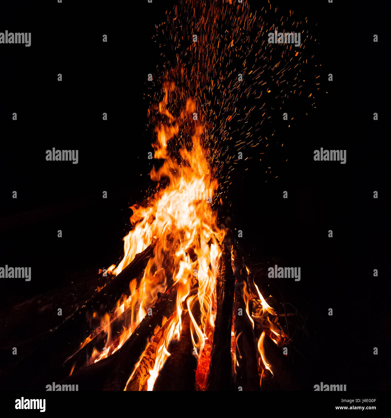 Campfire with flying sparks isolated on black background Stock Photo ...