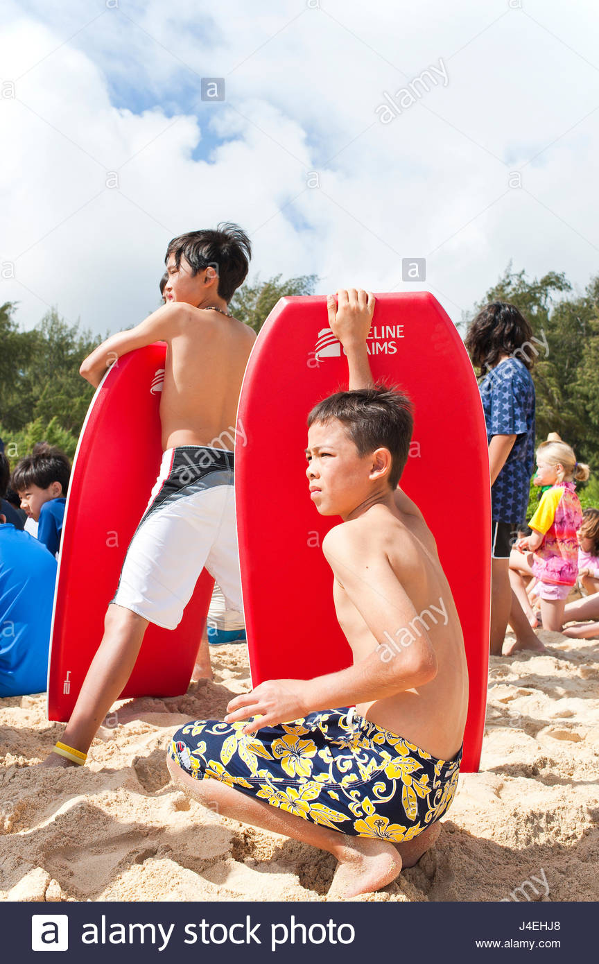 boy wearing swimming trunks