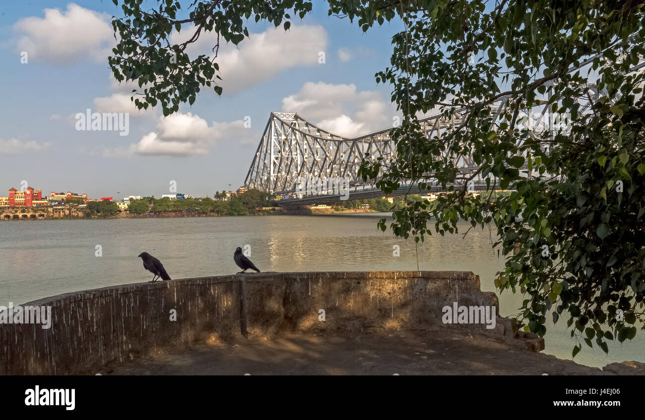Howrah bridge on the river Hooghly at Kolkata - the historical bridge is the longest cantilever bridge in India. Stock Photo
