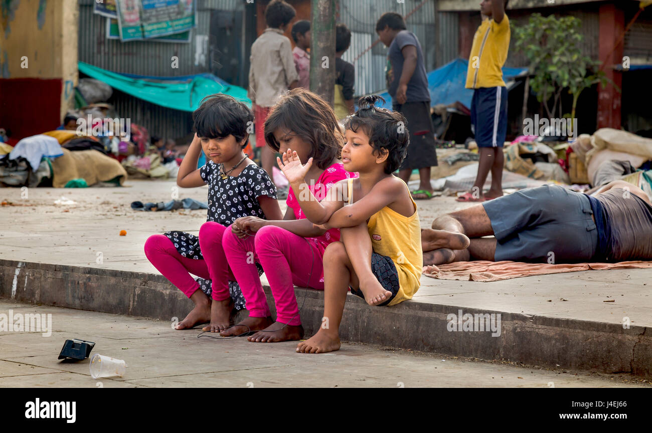 Street kids have a good time at a slum area at Mallick ghat Kolkata, India. Stock Photo