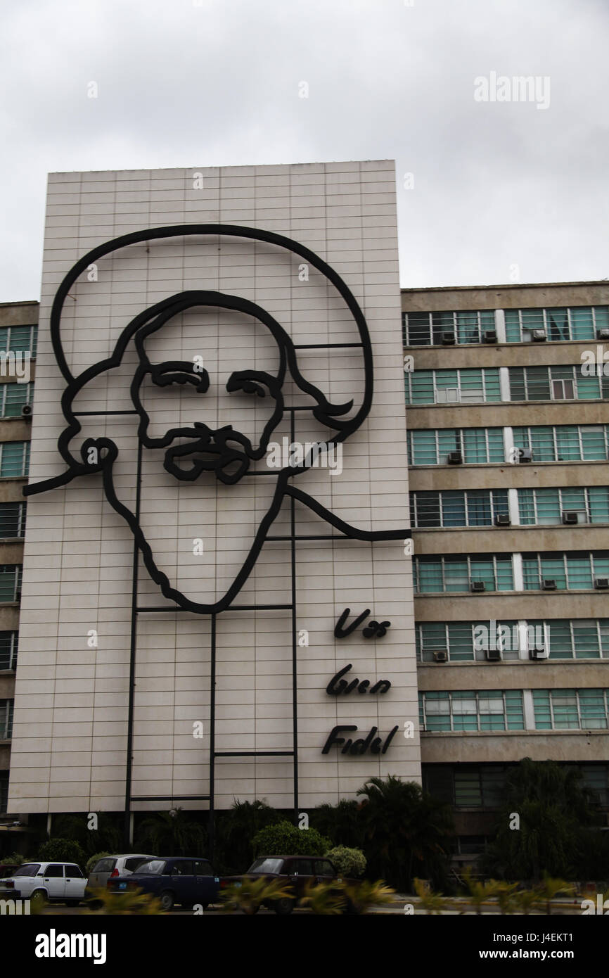 Camilo Cienfuegos,Fidel Castro's right-hand man during the revolution, is outlined in iron on the front façade in Havana's revolution sq. Stock Photo