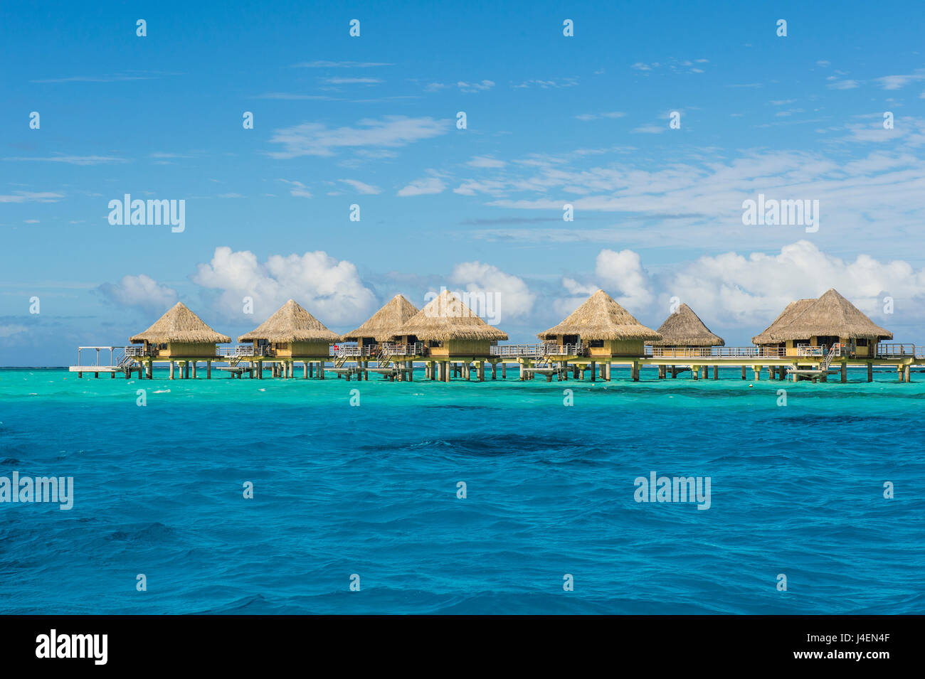 Overwater bungalows in luxury hotel in Bora Bora, Society Islands, French Polynesia, Pacific Stock Photo