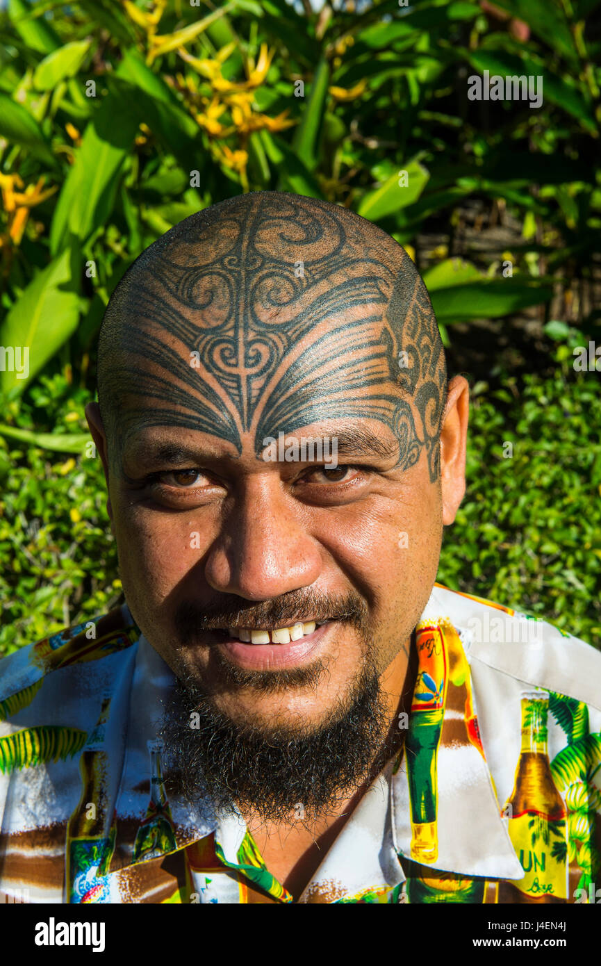 Man with traditional Marquesa tatoos on his head, Papeete, Tahiti, Society Islands, French Polynesia, Pacific Stock Photo