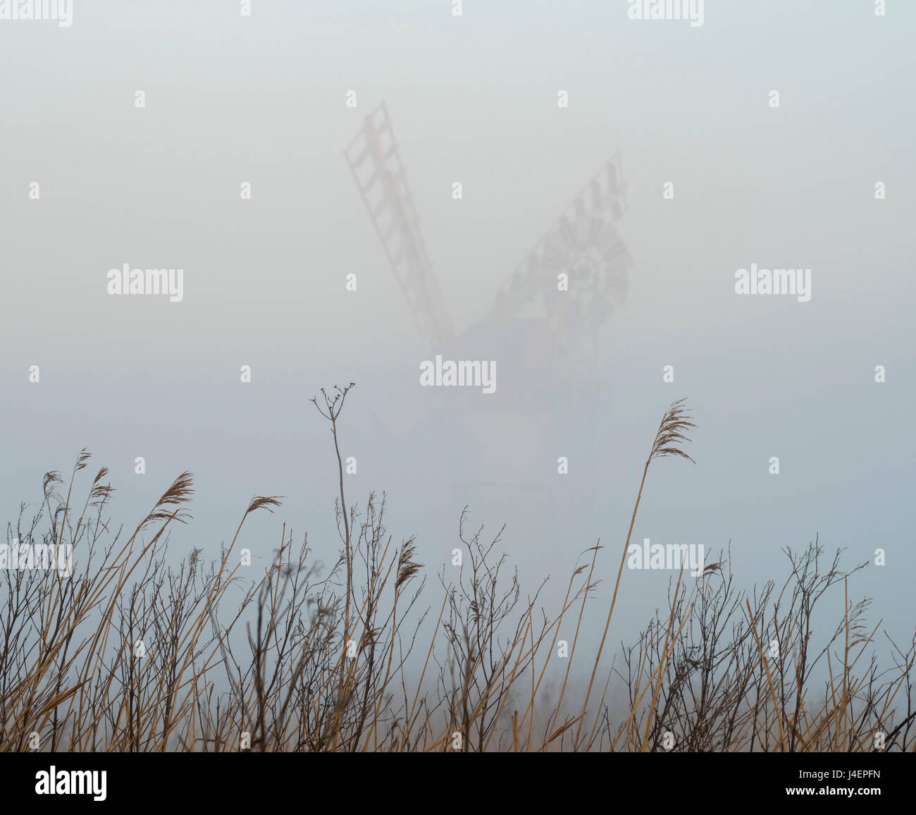 Thurne Mill viewed through the mist at Thurne, Norfolk, England, United Kingdom, Europe Stock Photo
