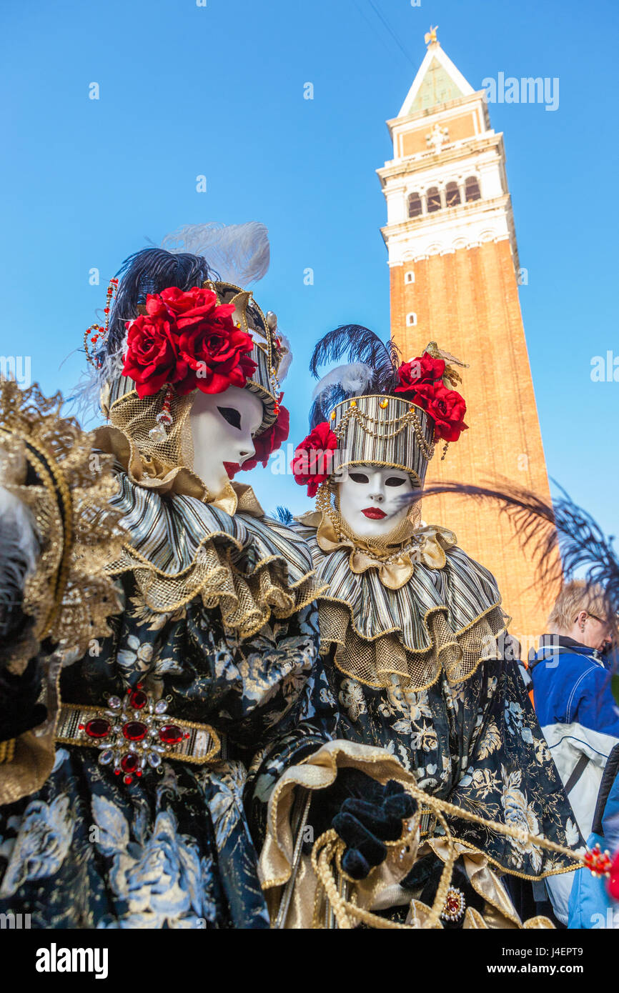 Colourful masks and costumes of the Carnival of Venice, famous festival worldwide, Venice, Veneto, Italy, Europe Stock Photo