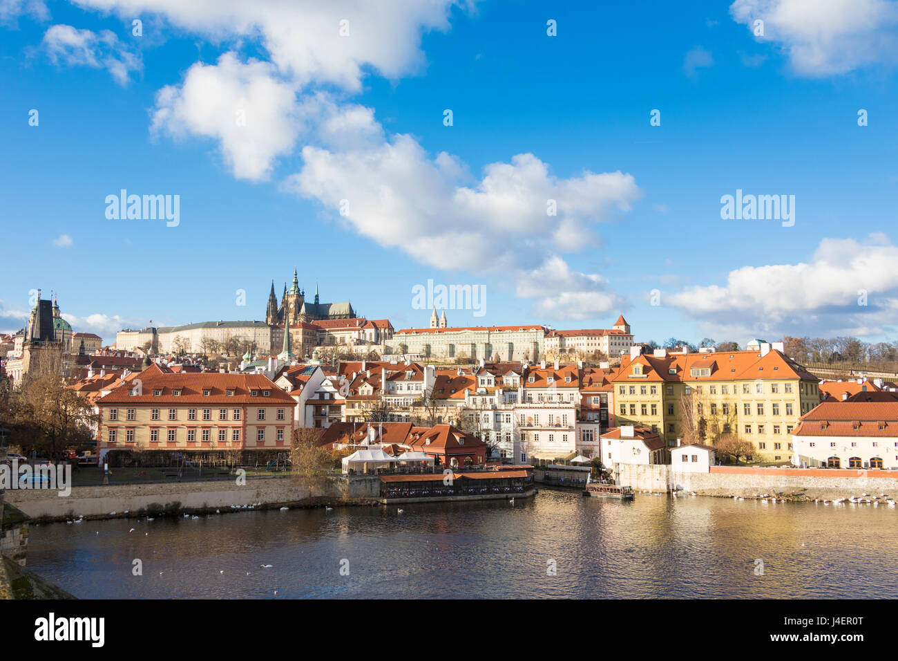 View of the Vltava River surrounded by the historical buildings, Prague, Czech Republic, Europe Stock Photo