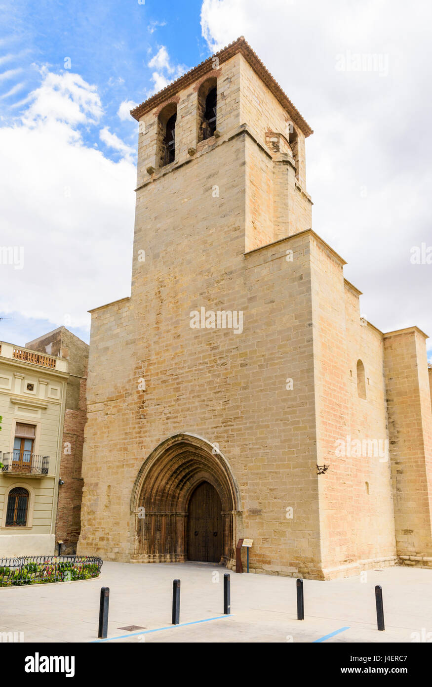 Bell tower facade of the Gothic Esglesia Vella de Sant Miquel, Placa de l’Esglesia, L'Espluga de Francoli, Tarragona, Catalonia, Spain Stock Photo