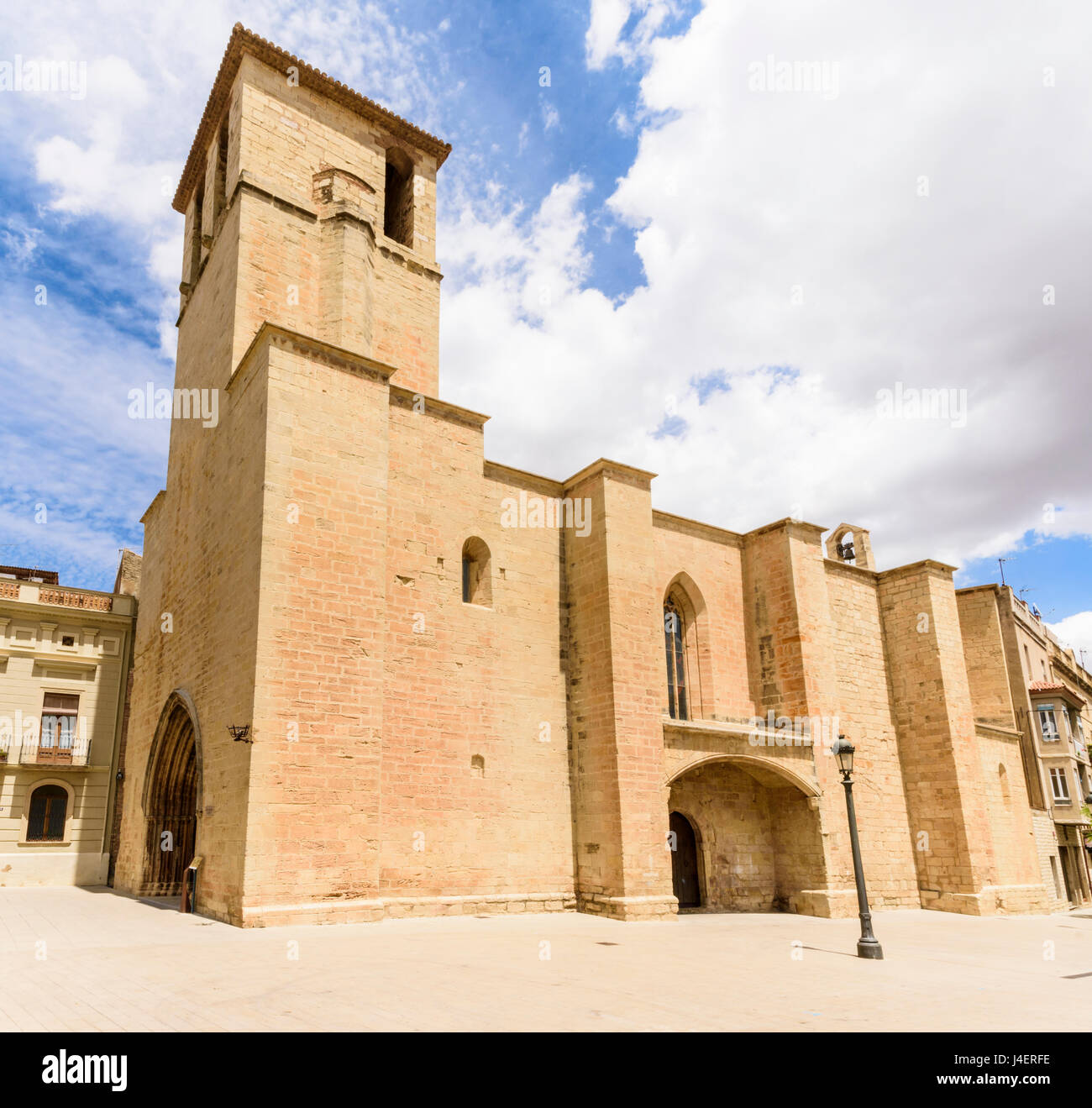 Facade of the Gothic Esglesia Vella de Sant Miquel, Placa de l’Esglesia, L'Espluga de Francoli, Tarragona, Catalonia, Spain Stock Photo