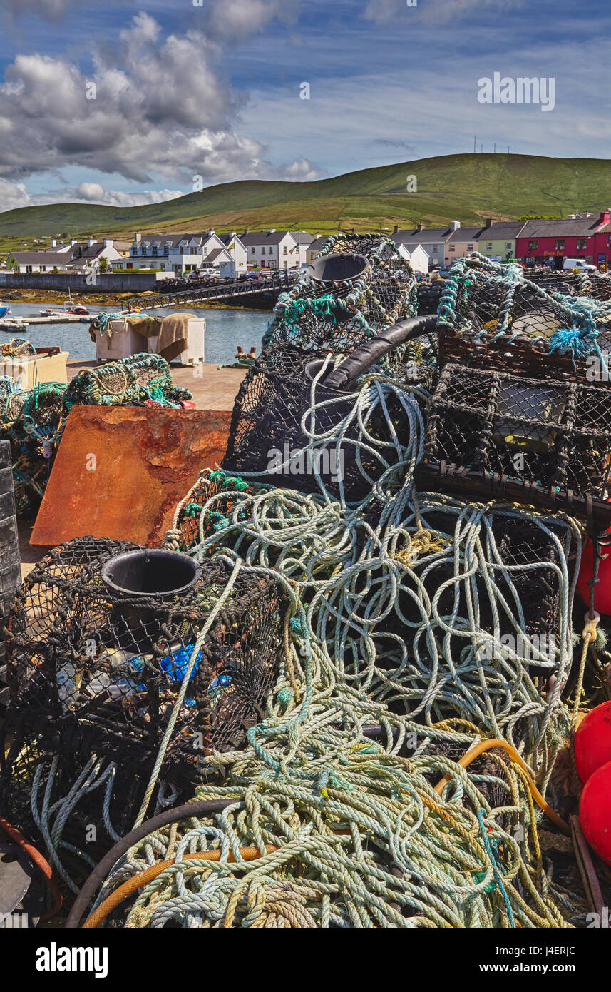 Crab pots piled up on the wharf at Portmagee, Skelligs Ring, Ring of Kerry, County Kerry, Munster, Republic of Ireland, Europe Stock Photo