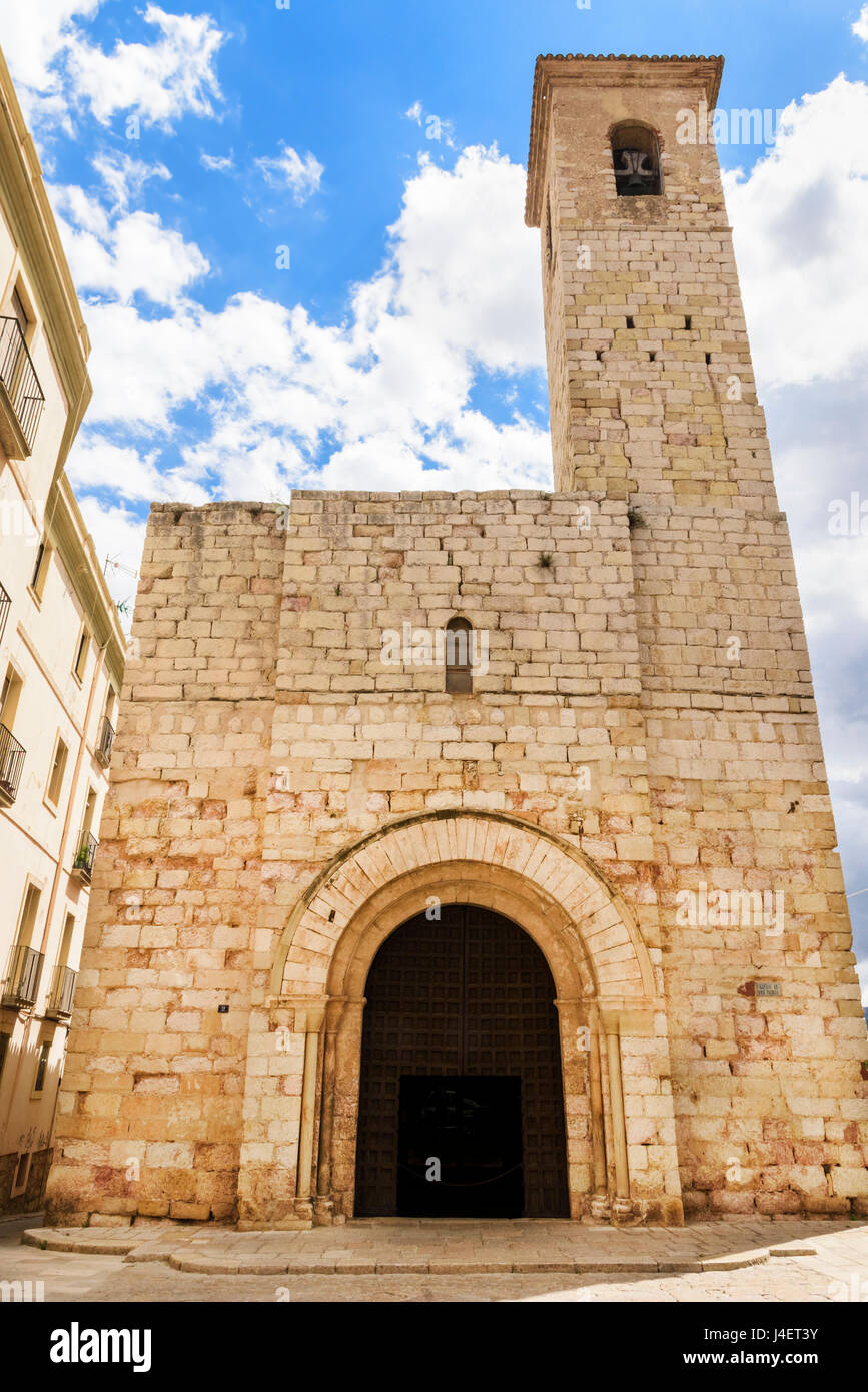 13th century Romanesque facade and bell tower of the Església de Sant Miquel, Montblanc, Tarragona, Catalonia, Spain Stock Photo