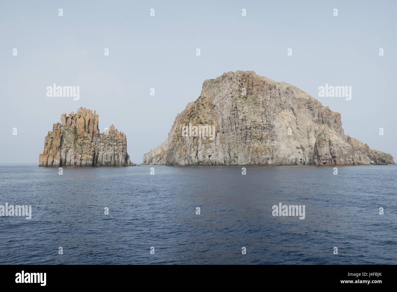 There's an interesting mighty rock in a sea near Panarea island on ...