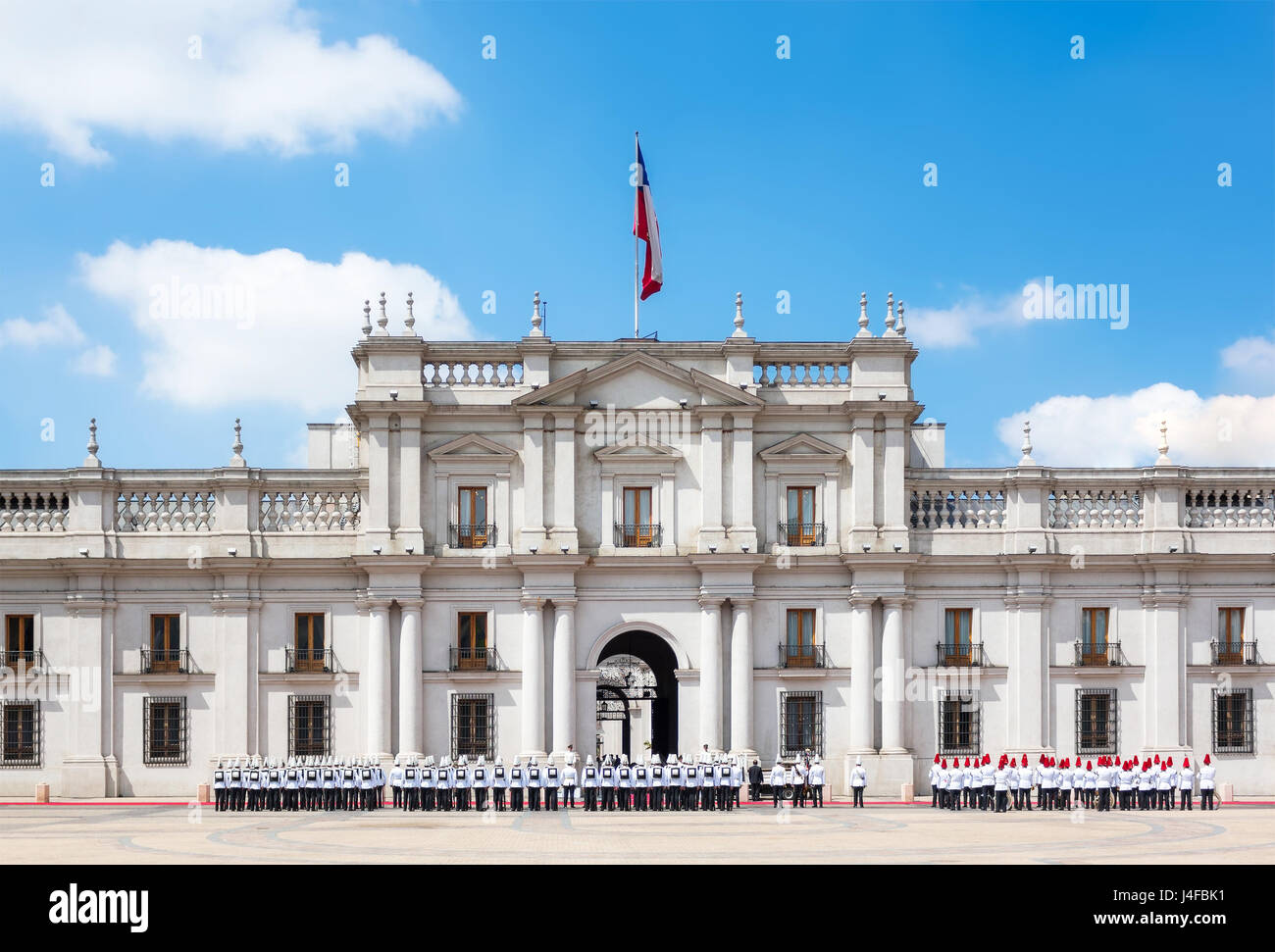 A public procession in front of La Moneda Palace (Palacio de La Moneda) in Santiago, Chile. Stock Photo