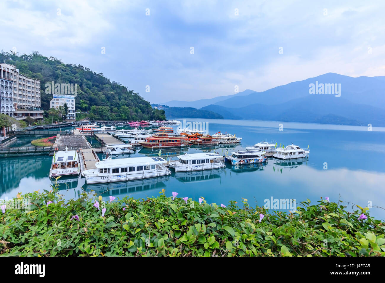 Long exposure of harbor with boats in the morning time at Sun Moon Lake Stock Photo