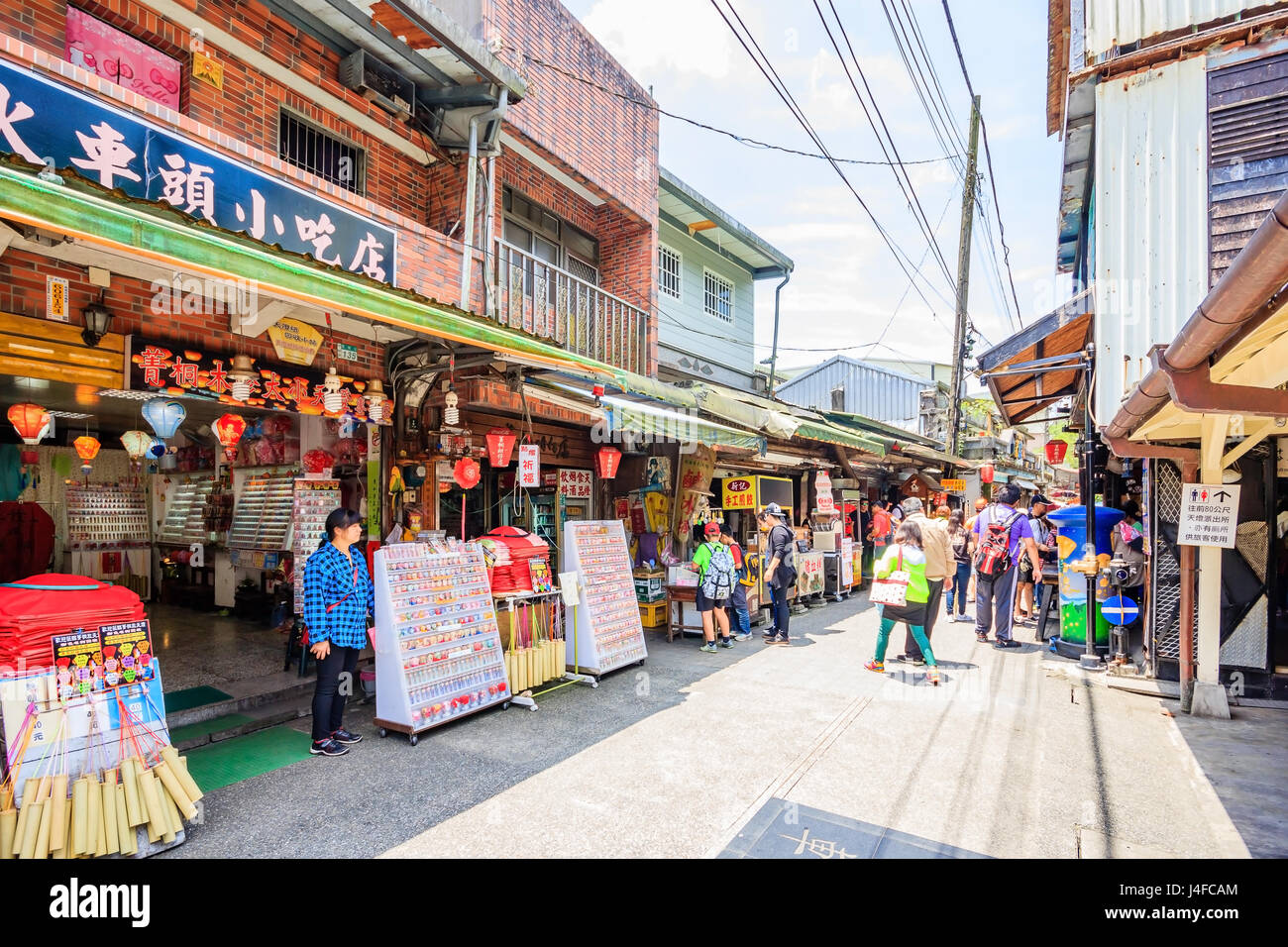 Unidentified people visit shifen Old Street section of Pingxi District. Stock Photo