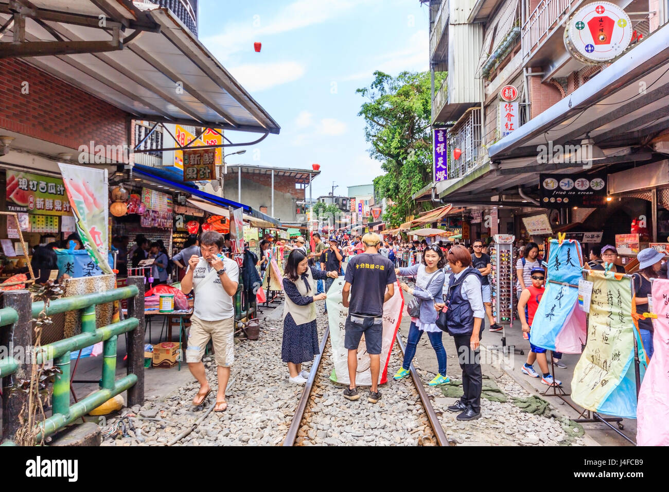 Unidentified people visit shifen Old Street section of Pingxi District. Stock Photo
