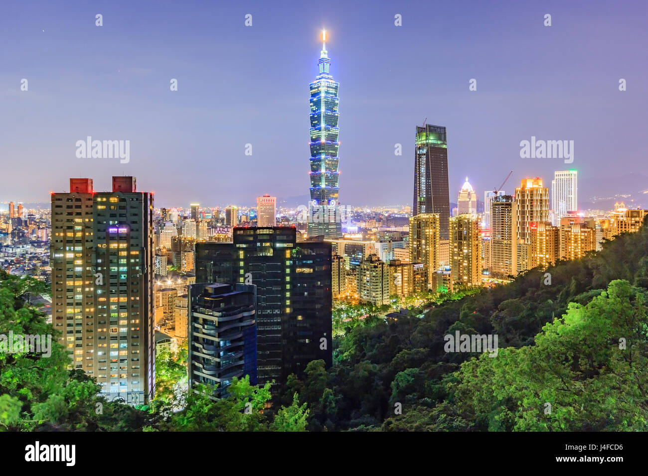 Taipei, Taiwan city skyline at sunset from view of Taipei City, make a hike to the top of Elephant Mountain Stock Photo