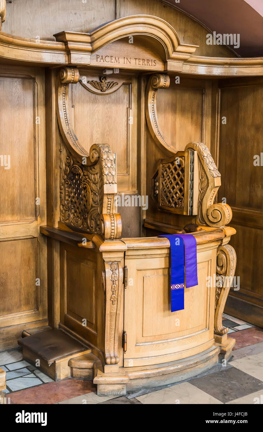 wooden confessionals in the church Stock Photo
