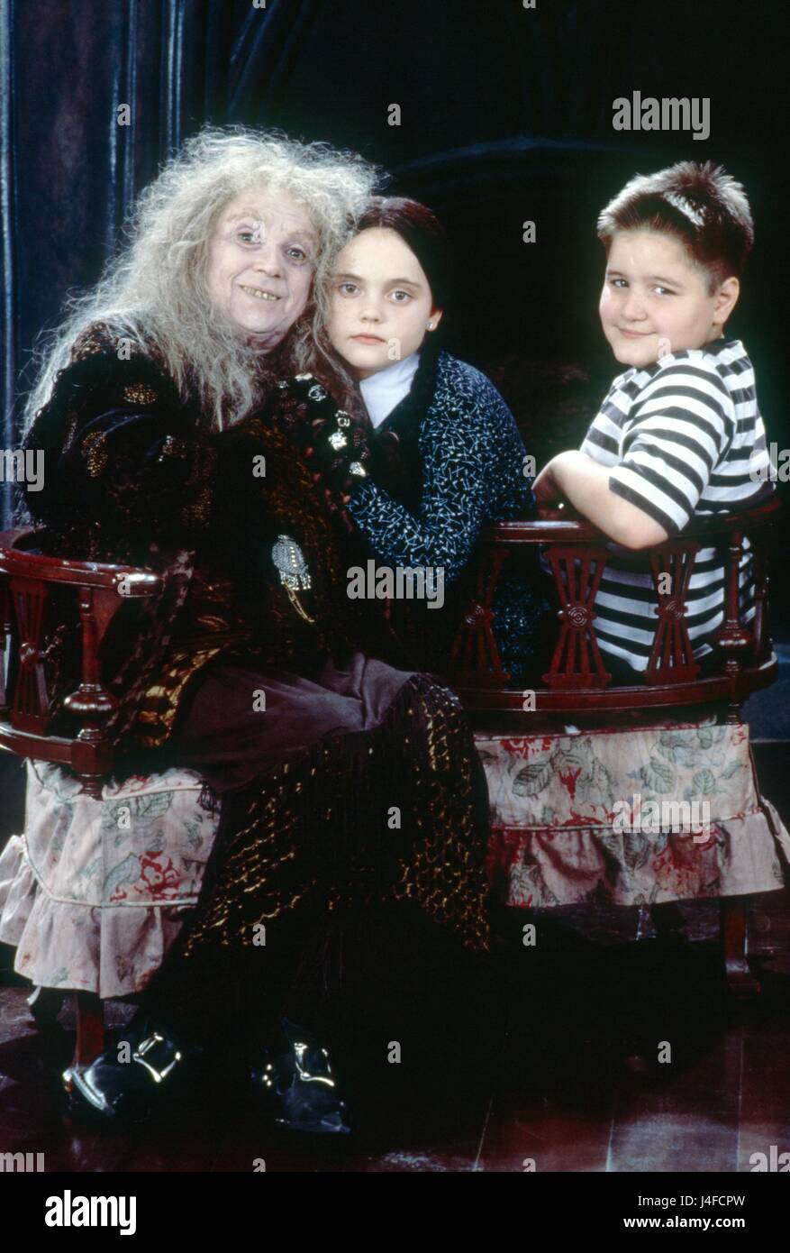 The Addams Family  Year : 1991  USA  Director : Barry Sonnenfeld  Judith Malina, Christina Ricci, Jimmy Workman      Photo: Jean Pagliuso.  It is forbidden to reproduce the photograph out of context of the promotion of the film. It must be credited to the Film Company and/or the photographer assigned by or authorized by/allowed on the set by the Film Company. Restricted to Editorial Use. Photo12 does not grant publicity rights of the persons represented. Stock Photo